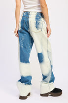 Back view of AVAH wide-leg jeans with bold tie-dye wash and relaxed fit