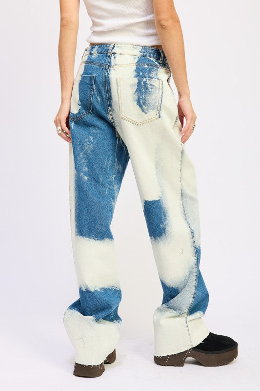 Back view of AVAH wide-leg jeans with bold tie-dye wash and relaxed fit