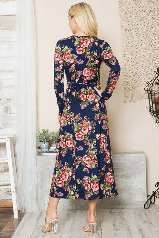Back of navy floral long sleeve dress showing wrap style