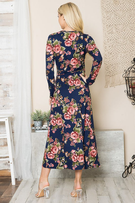 Back of navy floral long sleeve dress showing wrap style