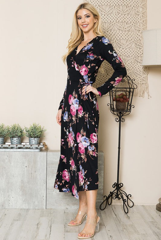 Side profile of black floral dress with long sleeves
