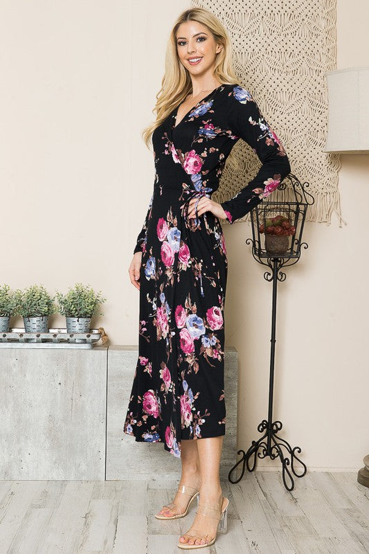 Side profile of black floral dress with long sleeves