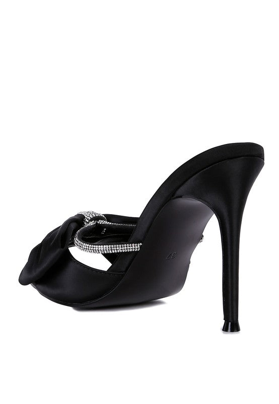 Back view of black satin bow stiletto mule with rhinestone strap