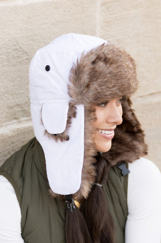 White quilted faux fur winter hat, side profile
