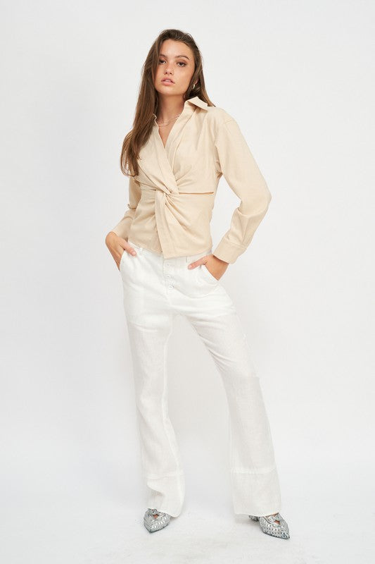 AVAH chic twist detail blouse styled with white trousers, full outfit view