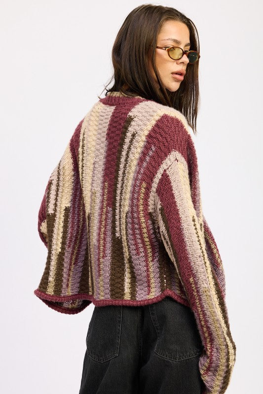 Back view of burgundy striped cardigan showing oversized relaxed fit and knit texture