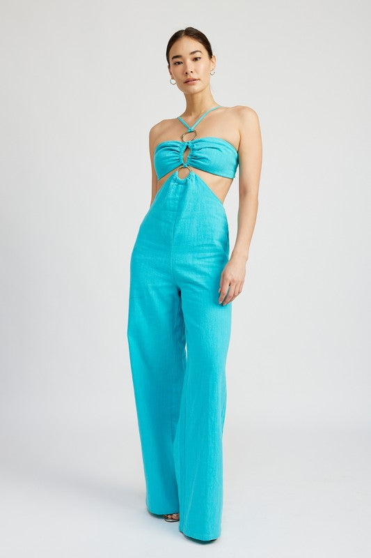 Angled front view of model wearing turquoise ring-detail jumpsuit