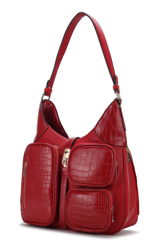 Red crocodile-embossed hobo bag with gold zippers and front utility pocket