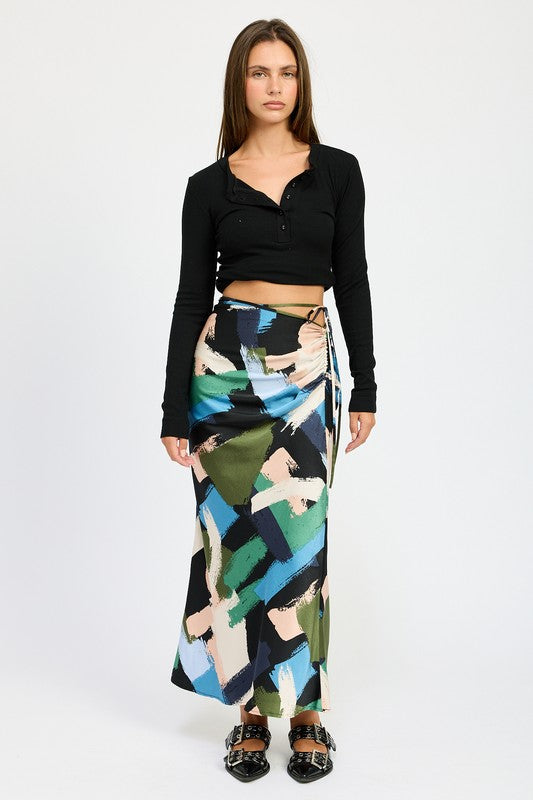 Abstract print wrap maxi skirt front view with side ruched detail