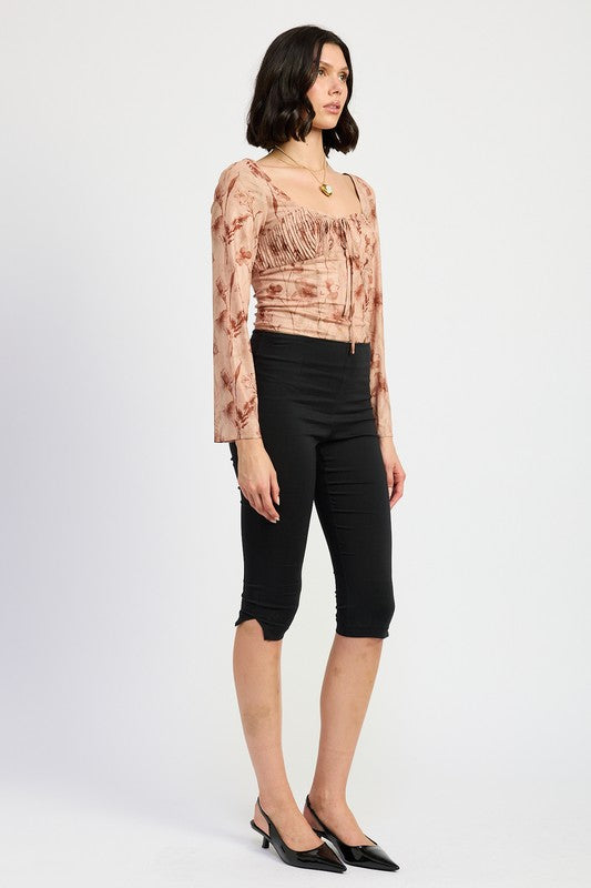 Fall transitional piece-brown floral long sleeve top, angled view