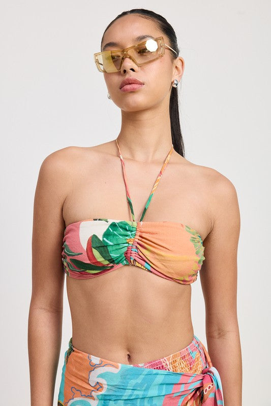 Portrait view with halter bandeau and statement sunglasses