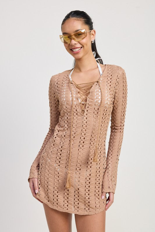 Front view of model wearing tan crochet beach cover-up with lace-up neckline and long sleeves-AVAH
