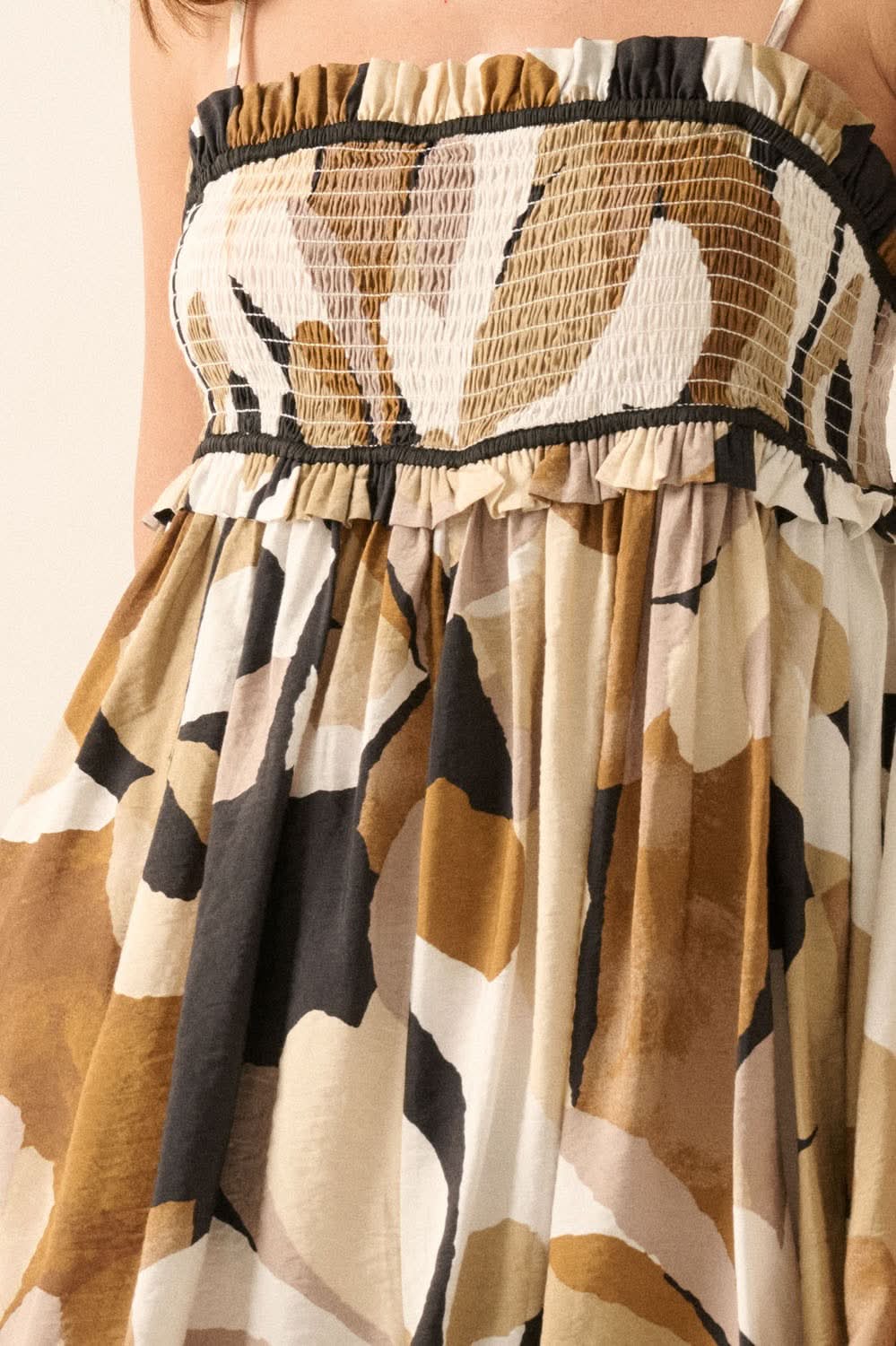 AVAH-Marbella Bloom Taupe and Black Smocked Floral Romper
