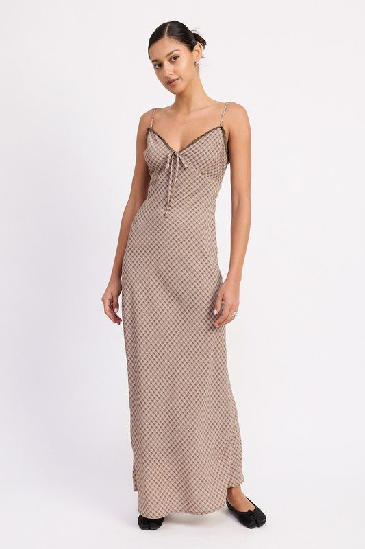 Full-length front view of printed lace-trim maxi dress