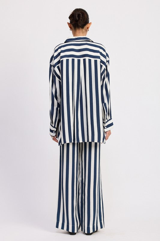 Back view of navy and white striped longline shirt