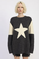 model wearing charcoal and ivory oversized star sweater-AVAH