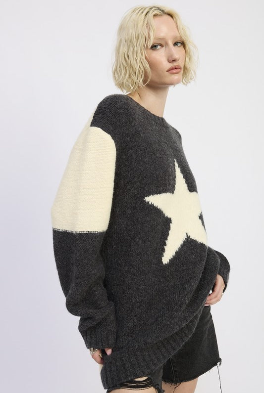 side view of charcoal and ivory star knit sweater