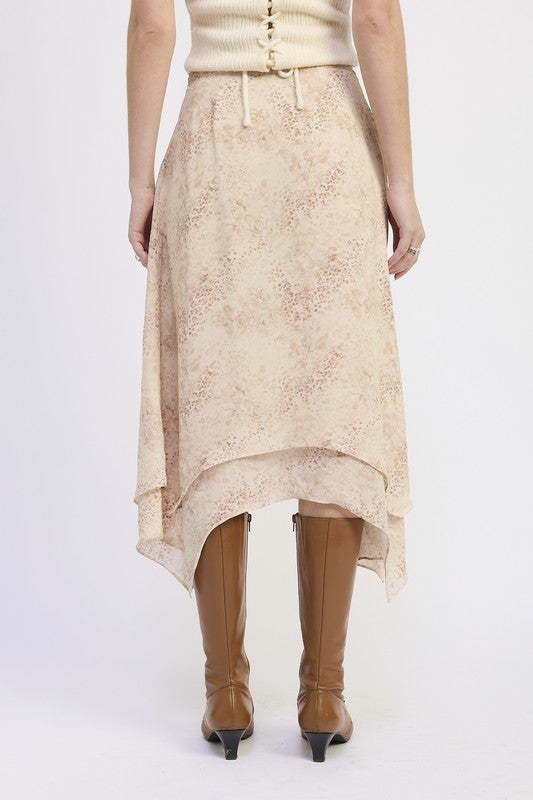 Back view of Wild Rose layered midi skirt with flowing layered hemline and subtle floral-leopard pattern