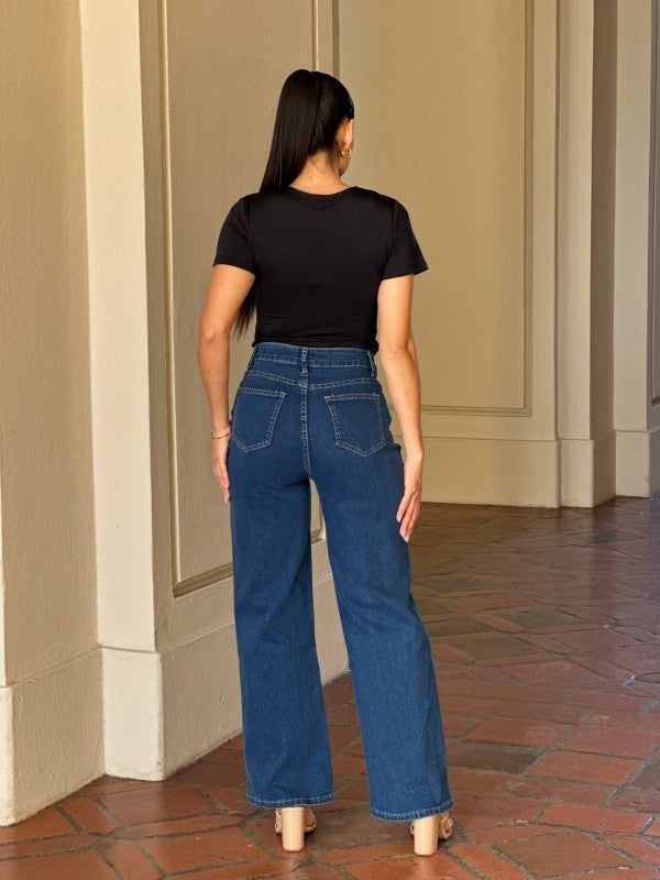 Back view of Sweetheart Distressed Wide-Leg Jeans showing wide-leg silhouette and patch pockets.