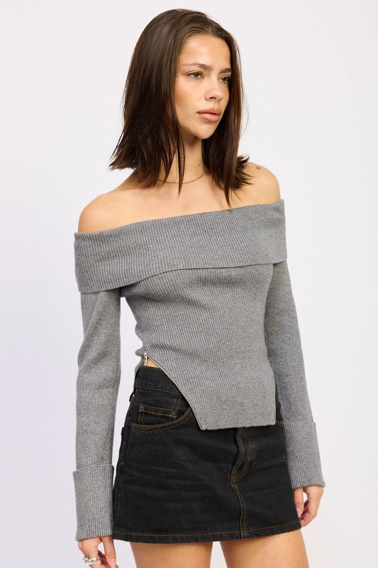 Grey off the shoulder ribbed sweater with wide cuff sleeves and side zippers, angled view