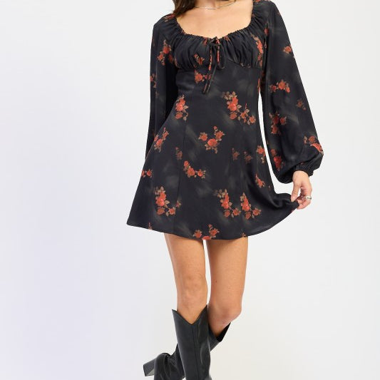 model wearing black floral mini dress with red blossoms and long puff sleeves-AVAH