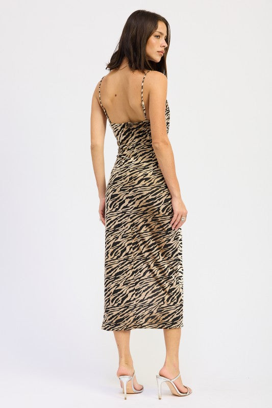 Back view of zebra print midi dress with open back, thin adjustable straps, and fitted silhouette-AVAH