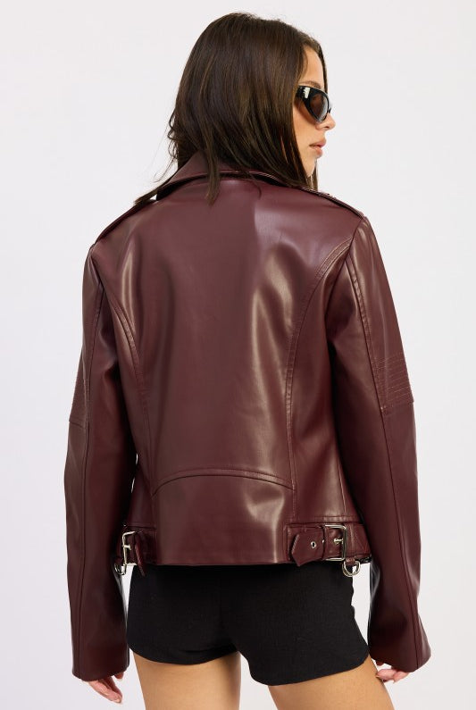 Back view showing structured paneling and adjustable hem tabs.