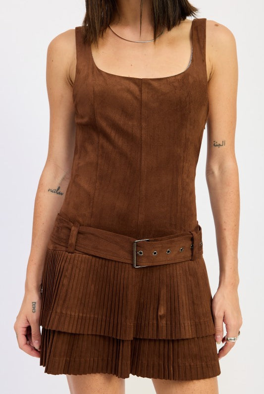 close-up of belted faux suede mini dress showing pleated skirt