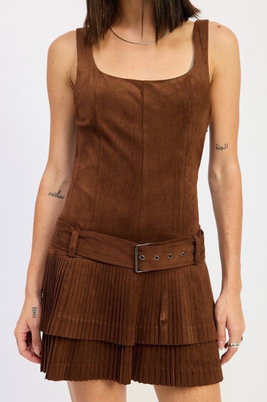close-up of belted faux suede mini dress showing pleated skirt