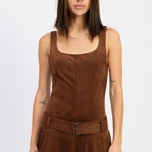 model wearing brown suede pleated mini dress with belt detail-AVAH