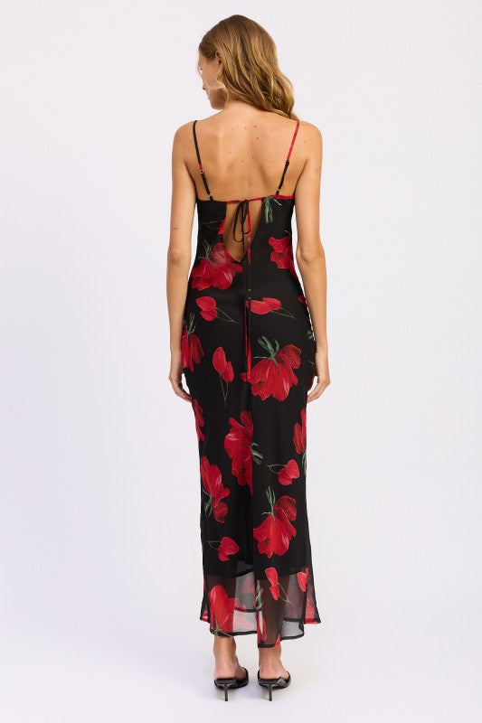 Back view of black maxi dress with red floral print, open tie-back detail, and adjustable straps-AVAH