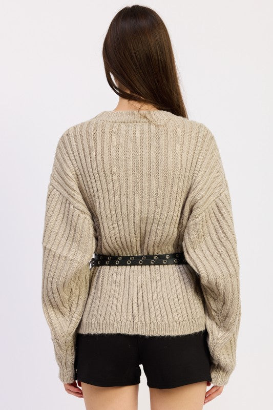 Back view of ribbed warm grey knit sweater with included black belt