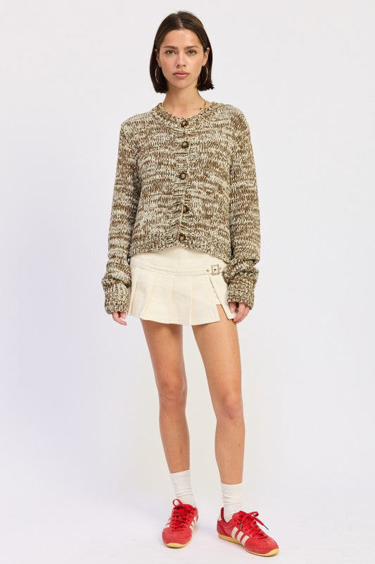 Full body front view of taupe brown knit sweater paired with cream skirt
