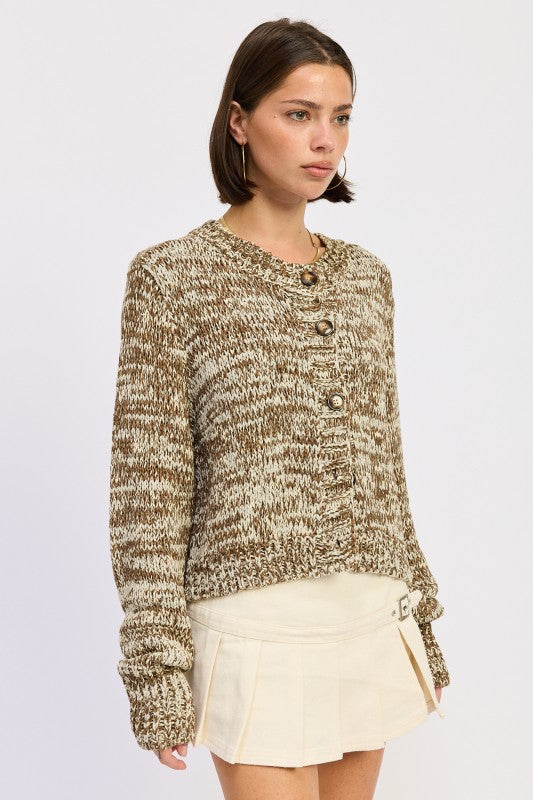 Side view of taupe brown marled knit sweater and relaxed silhouette