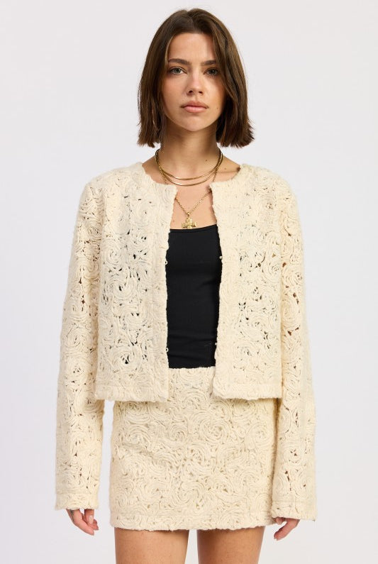 Front view of Ivory Reverie Textured Cropped Jacket in cream, featuring long sleeves and open front design-AVAH