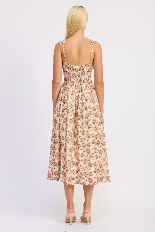Back view of ivory floral midi dress with smocked back and wide straps