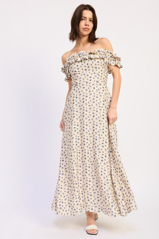 Floral maxi dress with flowing silhouette worn off shoulder