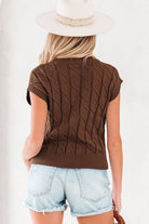Back view of brown cable knit sleeveless top showing ribbed hem and cap sleeves.