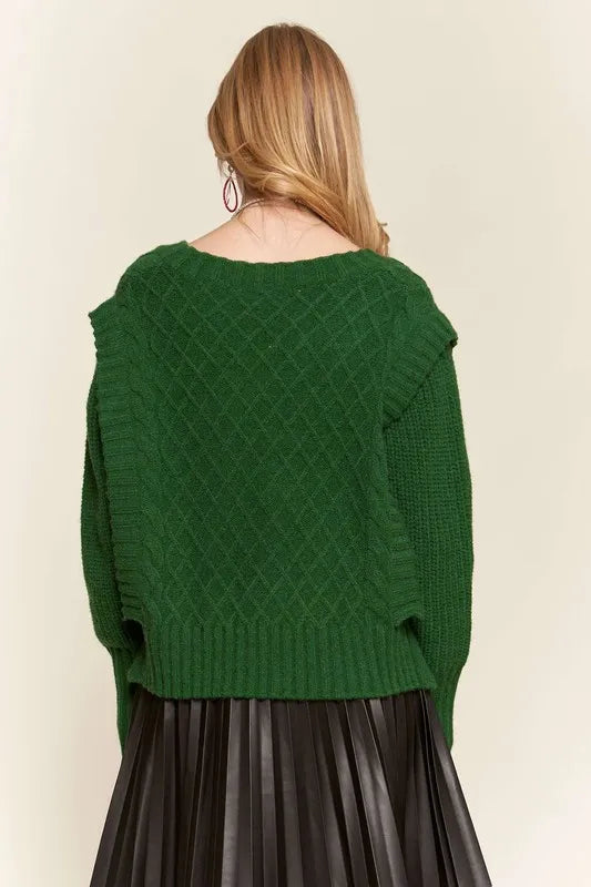 Back view of Emerald Isle Cable Knit Sweater with diamond knit pattern, ribbed shoulder trim and wide ribbed hem.