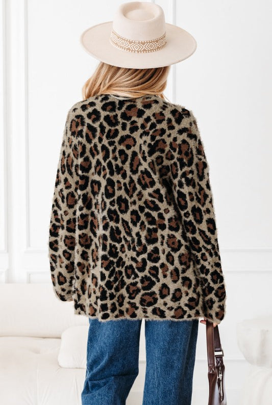 Back view of leopard print cardigan displaying full pattern.