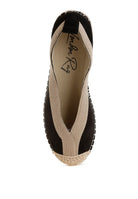 Top-down view of black espadrille showing deep V-cut beige trim and closed toe design
