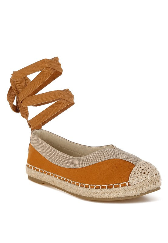 Tan flat espadrille with beige woven toe cap and lace-up ankle ties, front angle view-AVAH