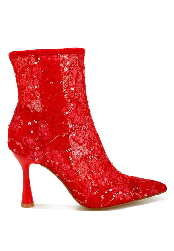 Side view of red lace ankle boot with zipper closure