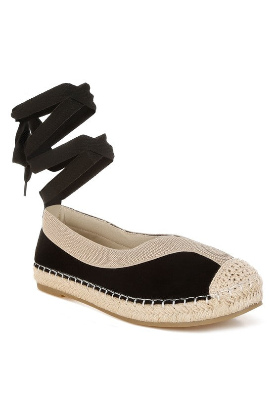 Black flat espadrille with beige woven details and lace-up ankle ties, front angle-AVAH