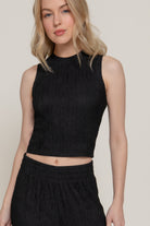 Close up of crinkle texture fabric for black matching set