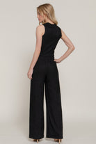 Rear view of model wearing wide leg pants and sleeveless top- matching set