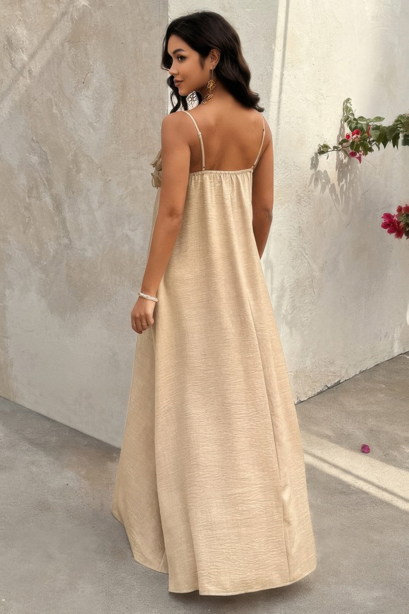 Back view of khaki maxi dress with adjustable thin straps and flowy silhouette