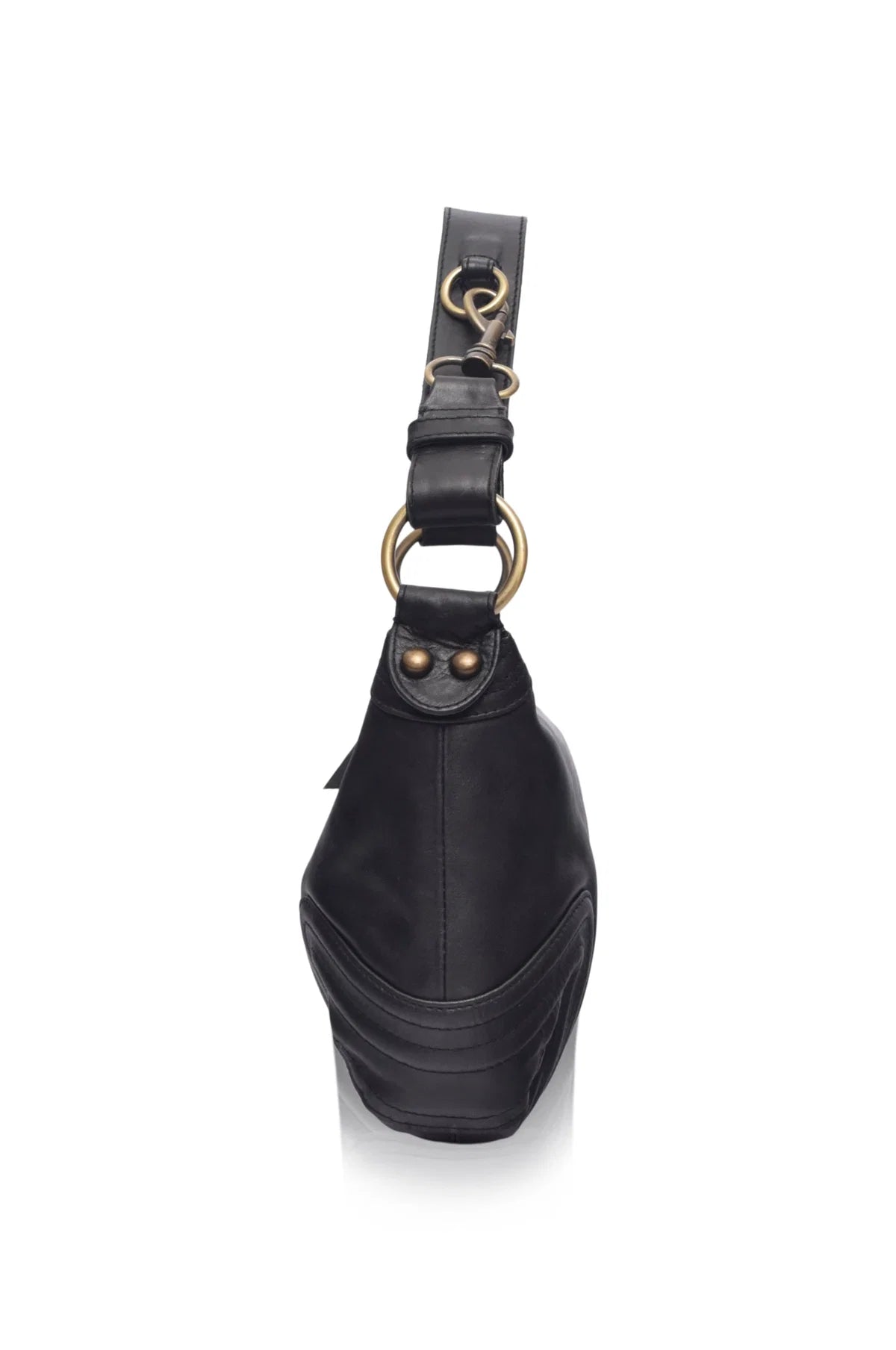 A black leather platform handbag shown from a rear three-quarter view, featuring a thick black platform sole, a wide shoulder strap, and a prominent gold-tone metal O-ring with a hook clasp.