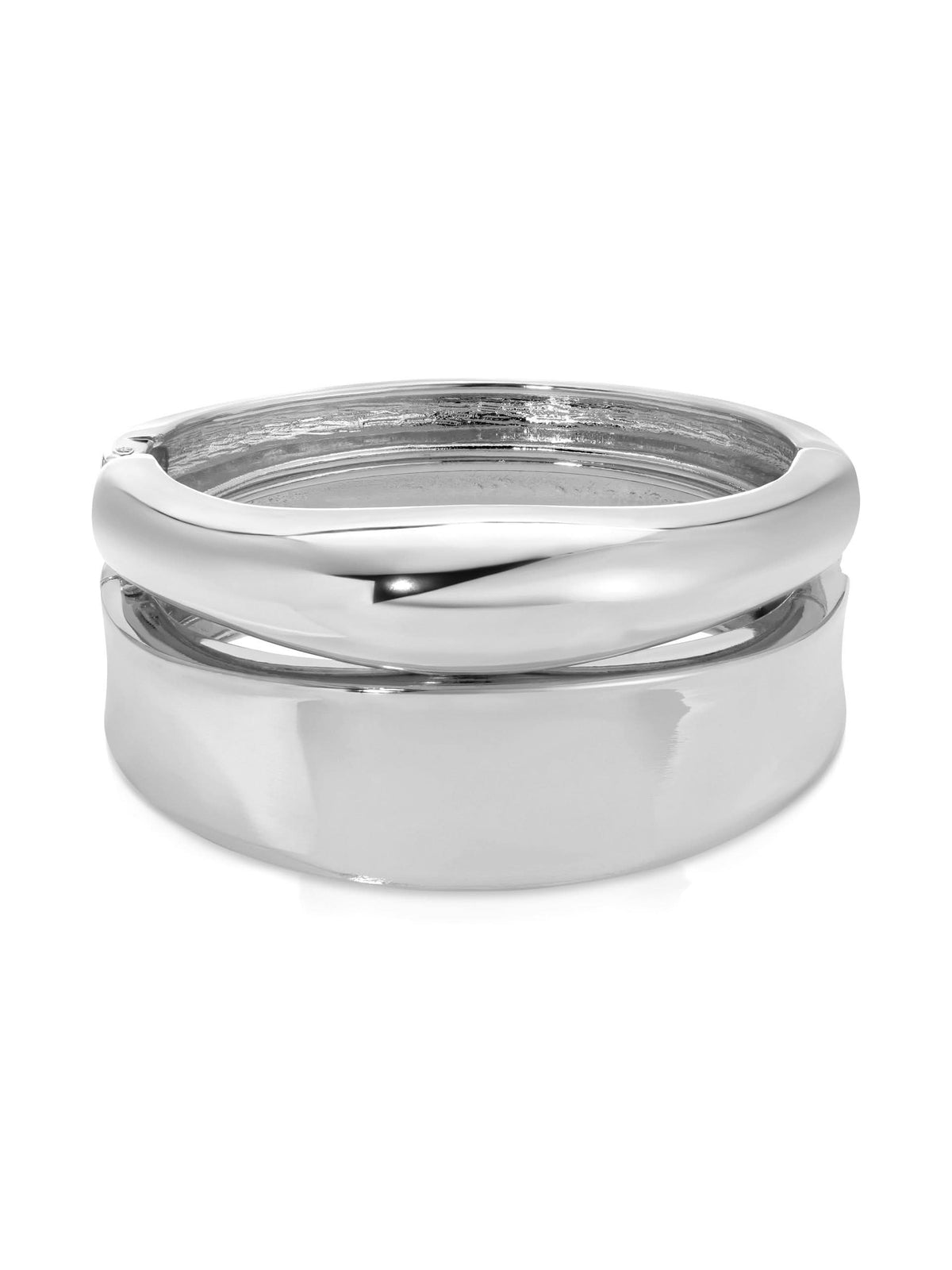 Two polished silver-tone hinged bangles stacked together on white background.