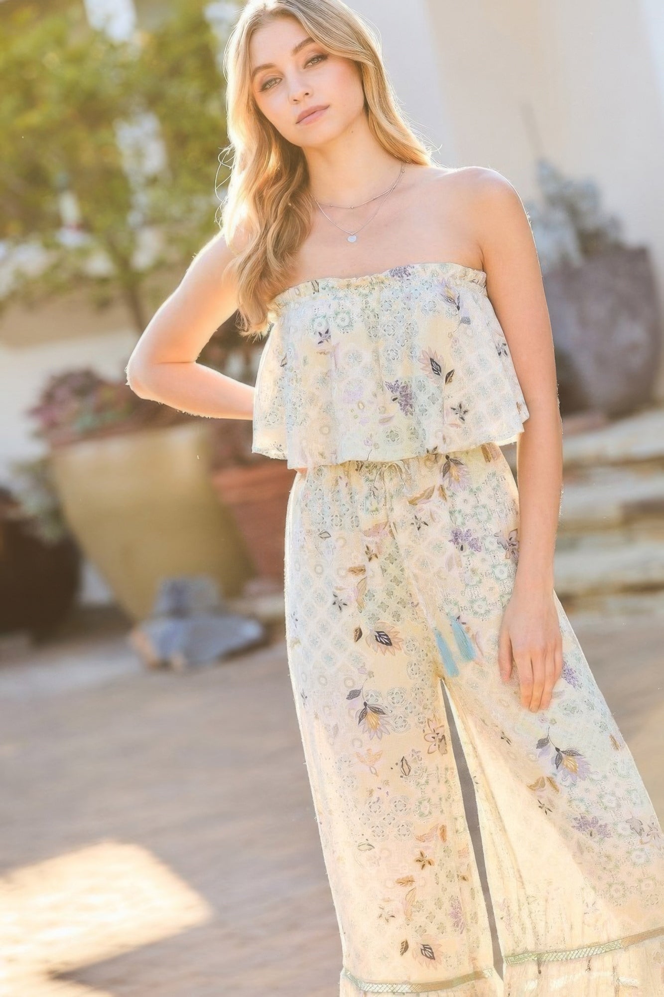 Front view of sage strapless bohemian jumpsuit with flounce bodice and tassel tie waist-AVAH